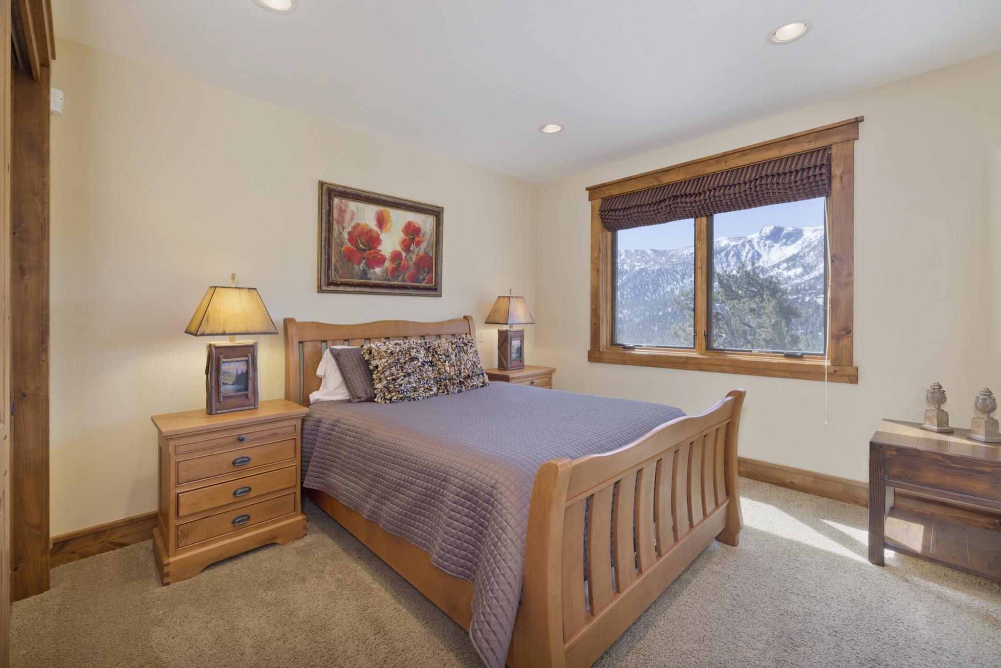 269 Juniper Road Mammoth Lakes, CA 93546 - Photo 44 of 56 a bedroom with a bed and a window