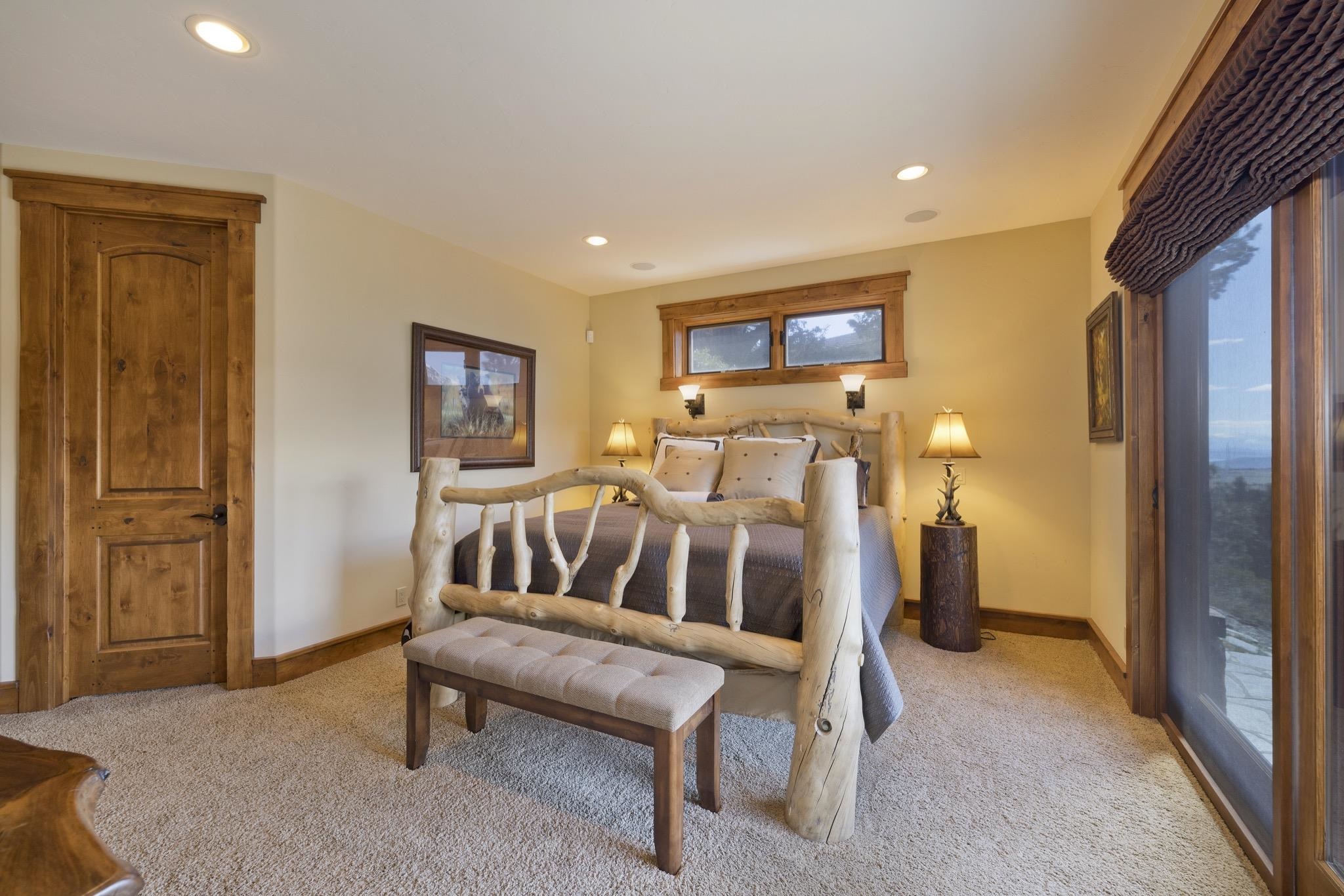 269 Juniper Road Mammoth Lakes, CA 93546 - Photo 46 of 56 a bedroom with furniture and a window