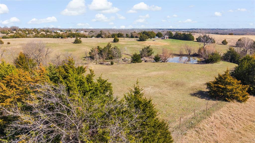 11016 South State Highway 78 Blue Ridge, TX 75424 - Photo 21 of 28 a view of a lake from a yard