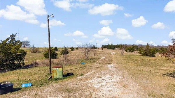 a view of an outdoor space and a yard
