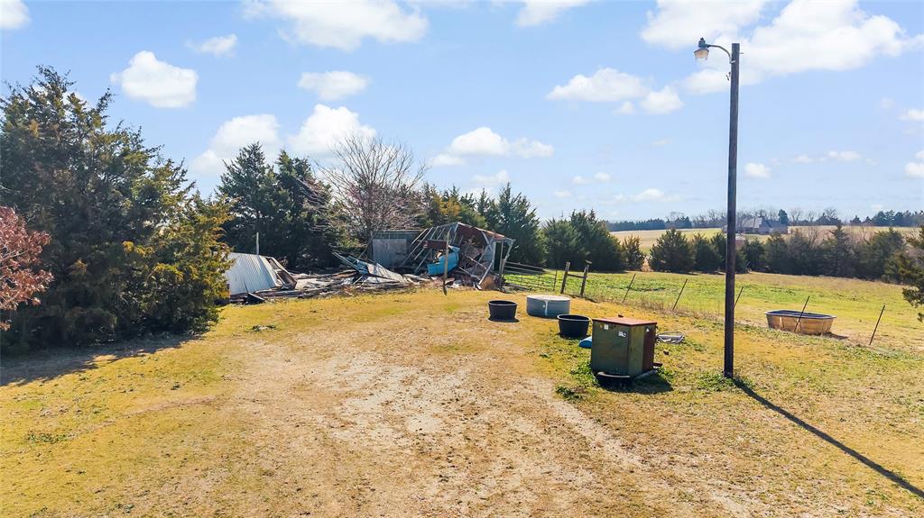 11016 South State Highway 78 Blue Ridge, TX 75424 - Photo 25 of 28 a view of a swimming pool with a lounge chairs