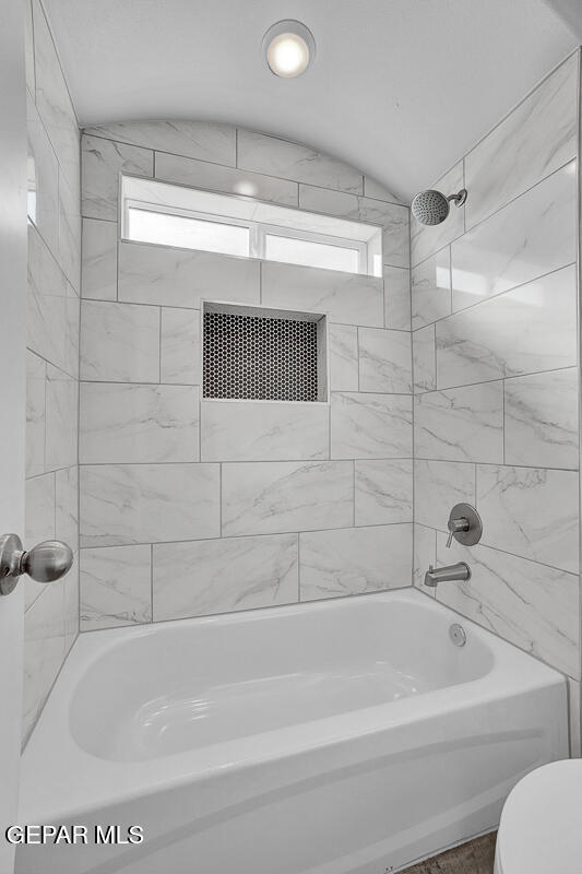 6924 Levee Circle Anthony, NM 88021 - Photo 28 of 36 a bathroom with a bathtub and a shower