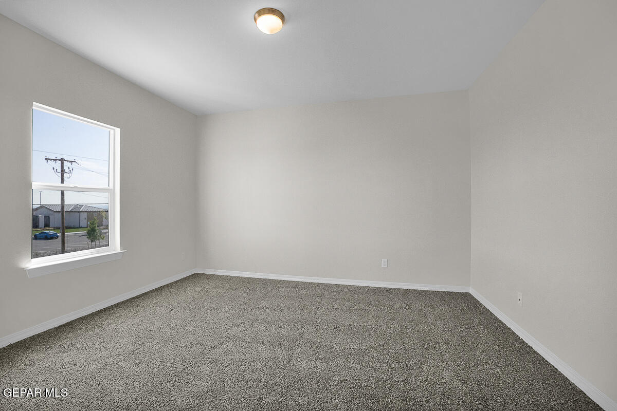 6924 Levee Circle Anthony, NM 88021 - Photo 29 of 36 an empty room with a window