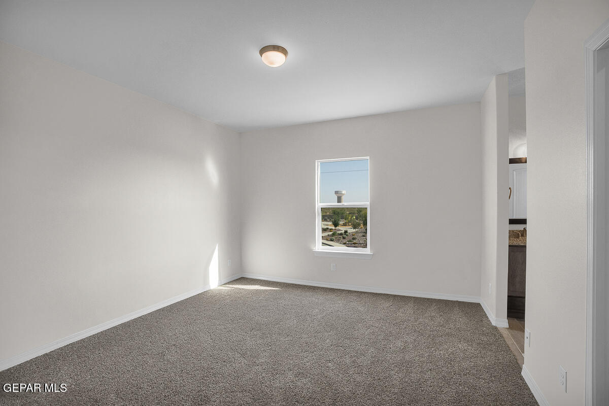 6924 Levee Circle Anthony, NM 88021 - Photo 33 of 36 an empty room with a window