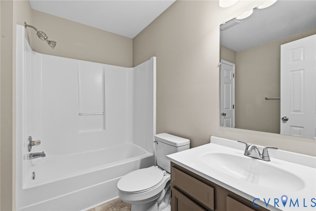 836 Walkerton Road Walkerton, VA 23177 - Photo 16 of 29 a bathroom with a sink toilet and shower