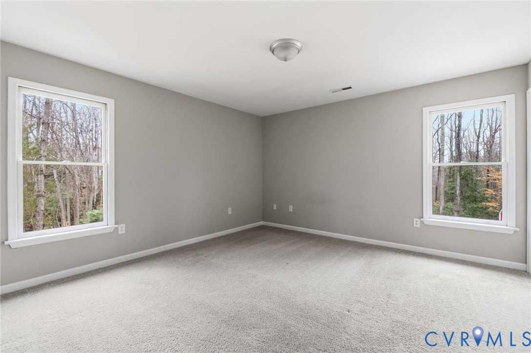 836 Walkerton Road Walkerton, VA 23177 - Photo 18 of 29 an empty room with a window