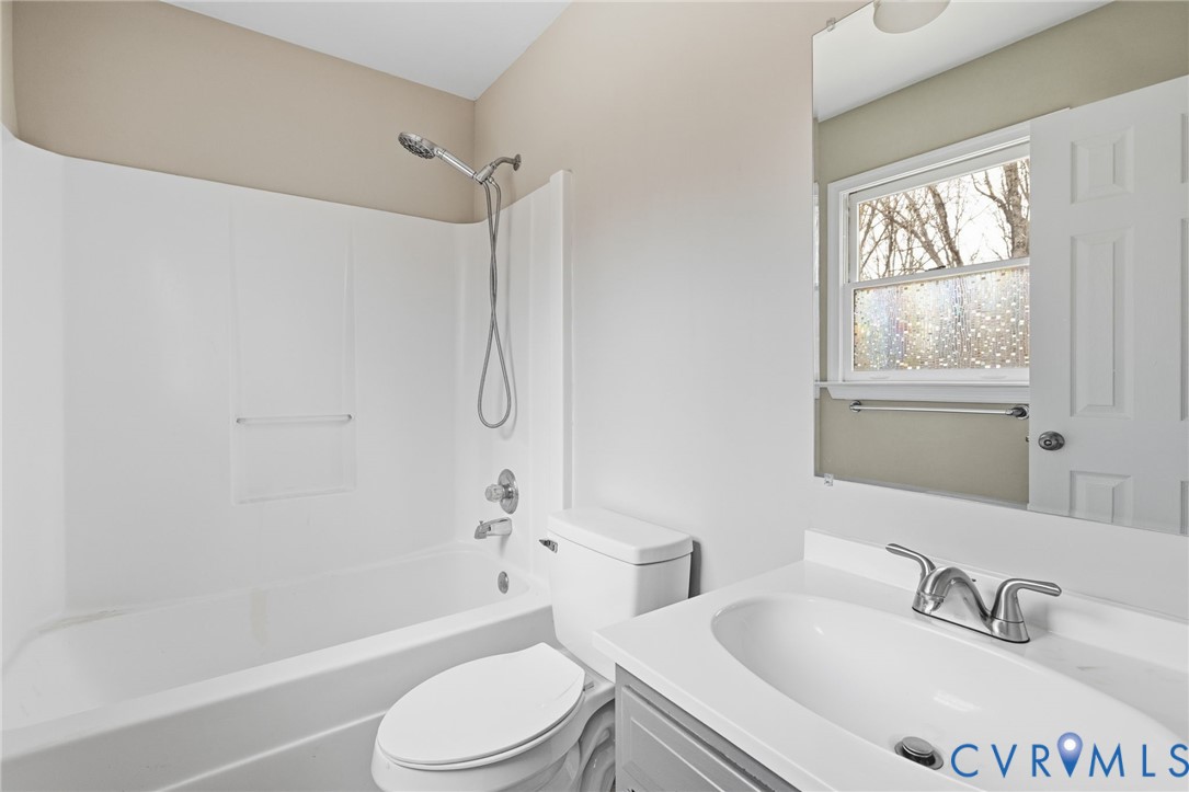 836 Walkerton Road Walkerton, VA 23177 - Photo 20 of 29 a bathroom with a sink toilet and shower
