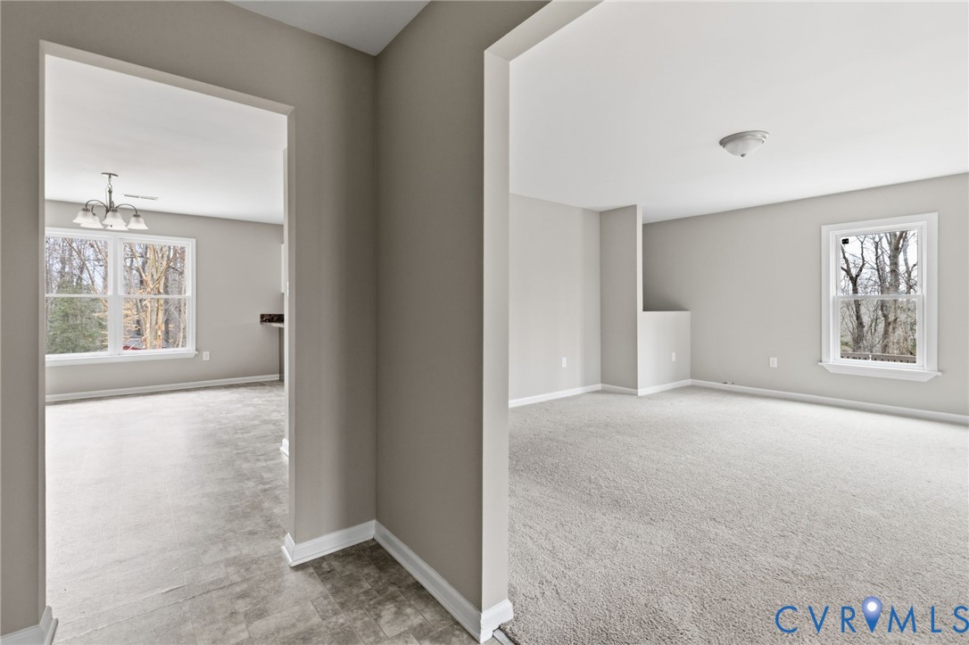 836 Walkerton Road Walkerton, VA 23177 - Photo 3 of 29 a view of an empty room with a window
