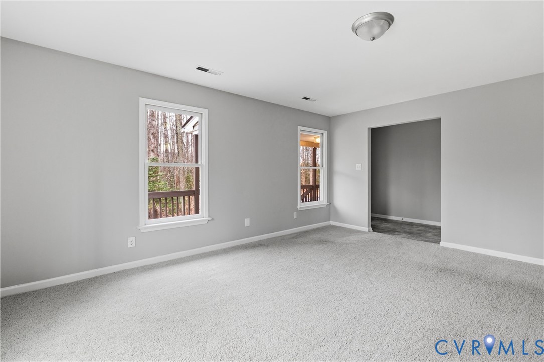 836 Walkerton Road Walkerton, VA 23177 - Photo 6 of 29 a view of an empty room with a window