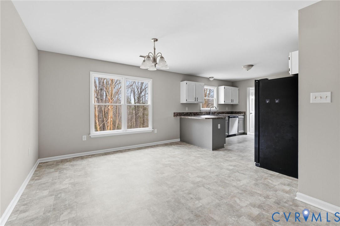 836 Walkerton Road Walkerton, VA 23177 - Photo 7 of 29 a view of kitchen with granite countertop cabinets and stainless steel appliances