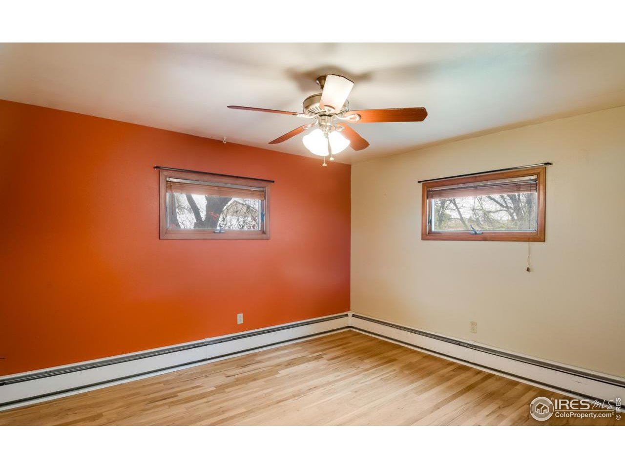 125 West Trilby Road Fort Collins, CO 80525 - Photo 13 of 26 a view of an empty room with a window
