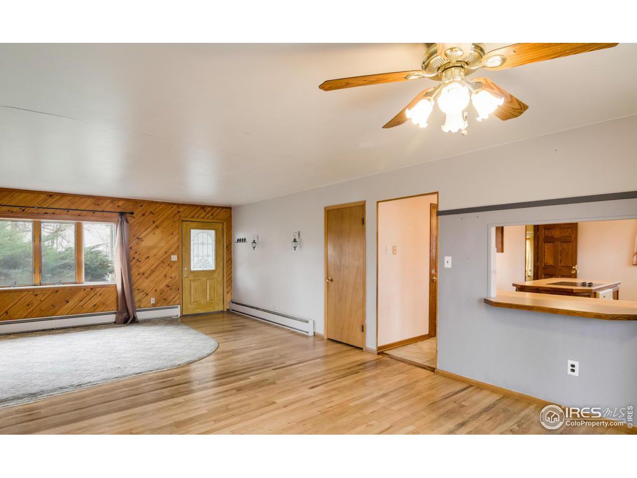 125 West Trilby Road Fort Collins, CO 80525 - Photo 14 of 26 a view of an empty room and window