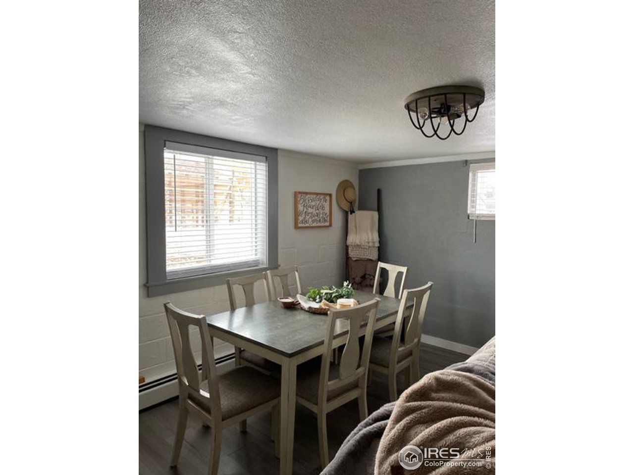 125 West Trilby Road Fort Collins, CO 80525 - Photo 20 of 26 a view of a dining room with furniture and window