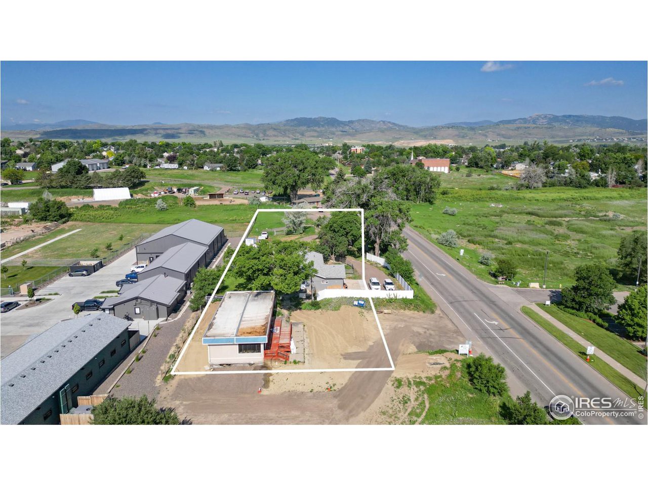 125 West Trilby Road Fort Collins, CO 80525 - Photo 2 of 26 a black and white photo of a city