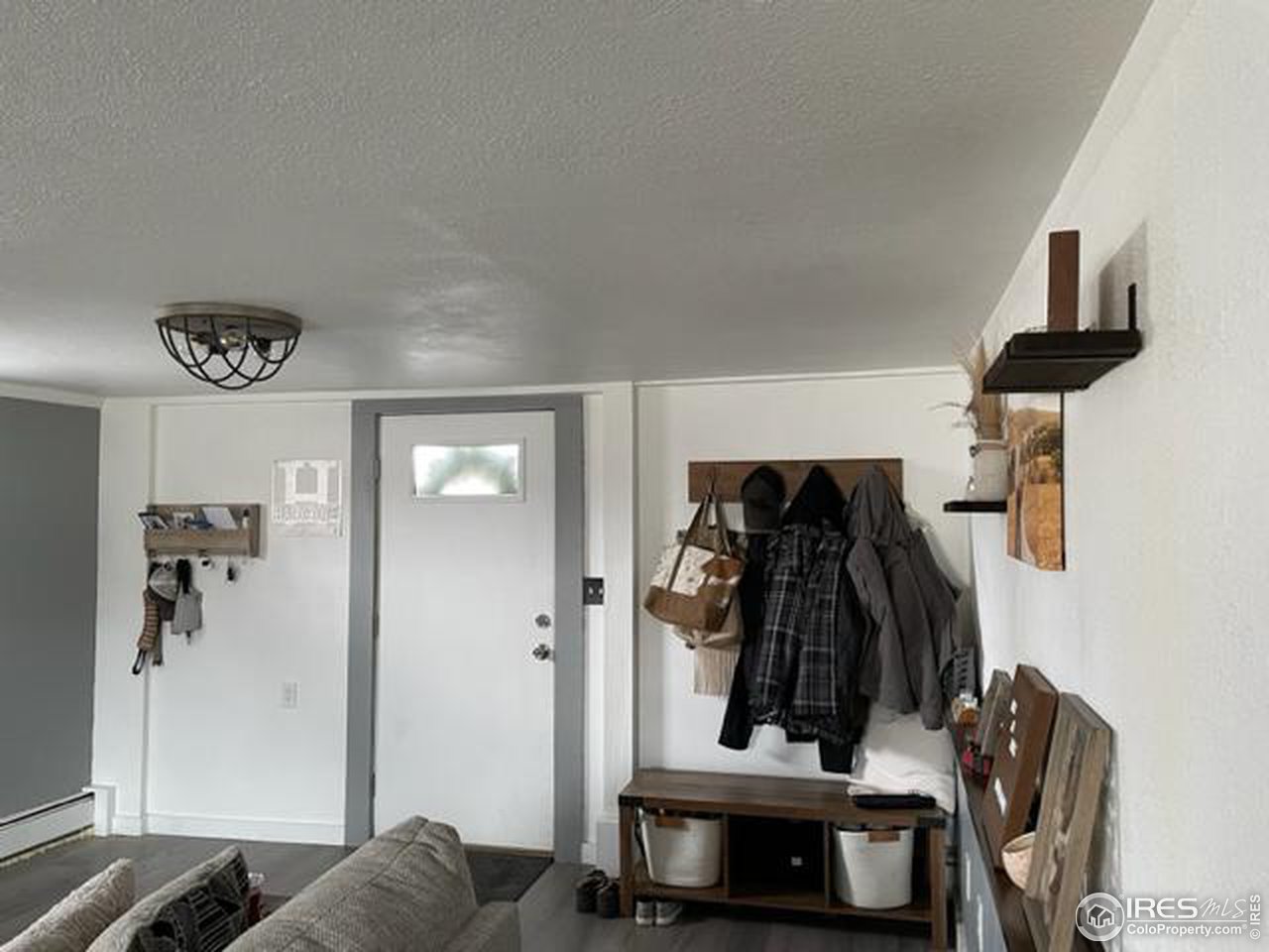 125 West Trilby Road Fort Collins, CO 80525 - Photo 24 of 26 a view of walk in closet with clothes and shoes