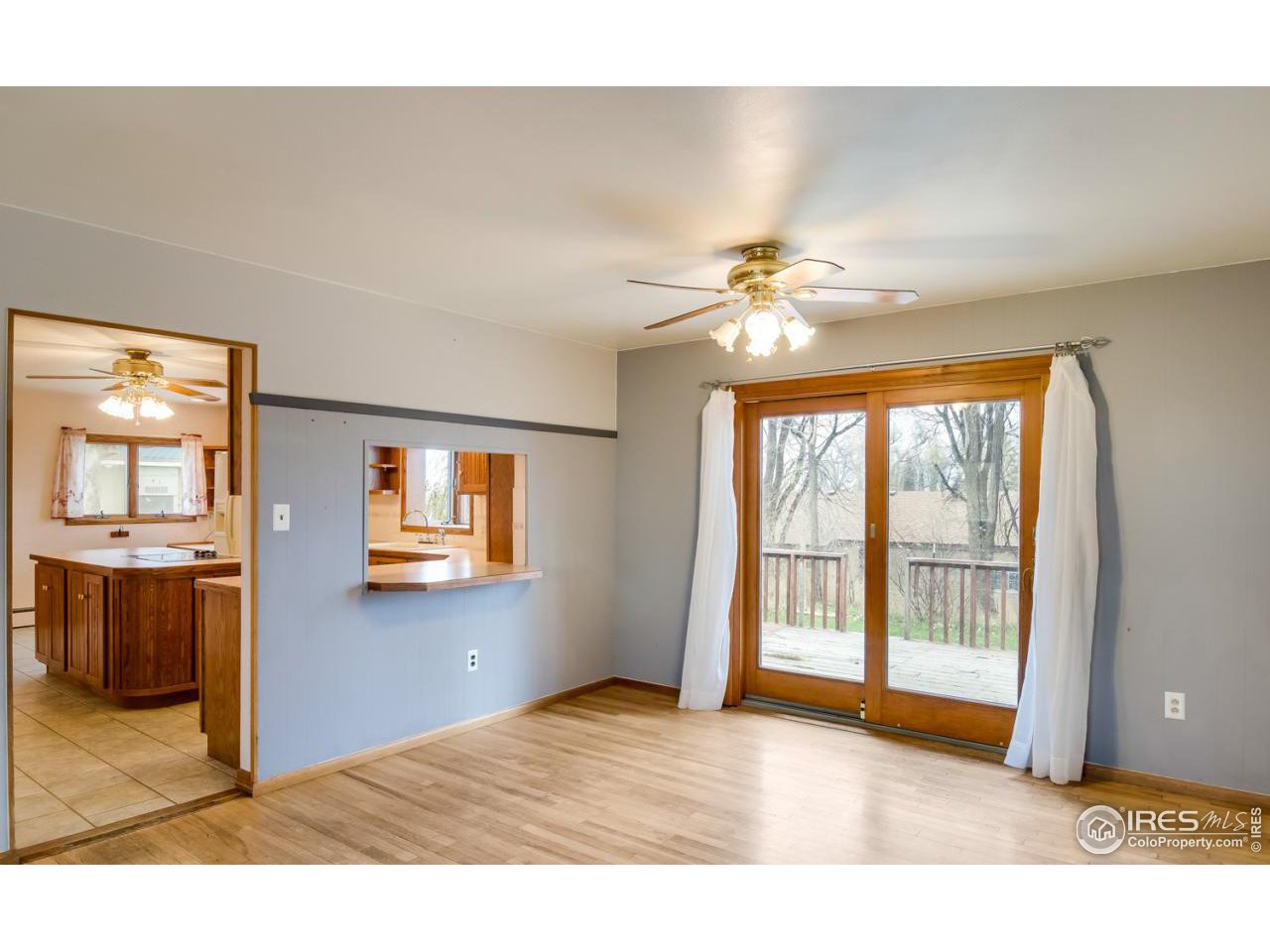 125 West Trilby Road Fort Collins, CO 80525 - Photo 10 of 26 a view of an empty room with a window