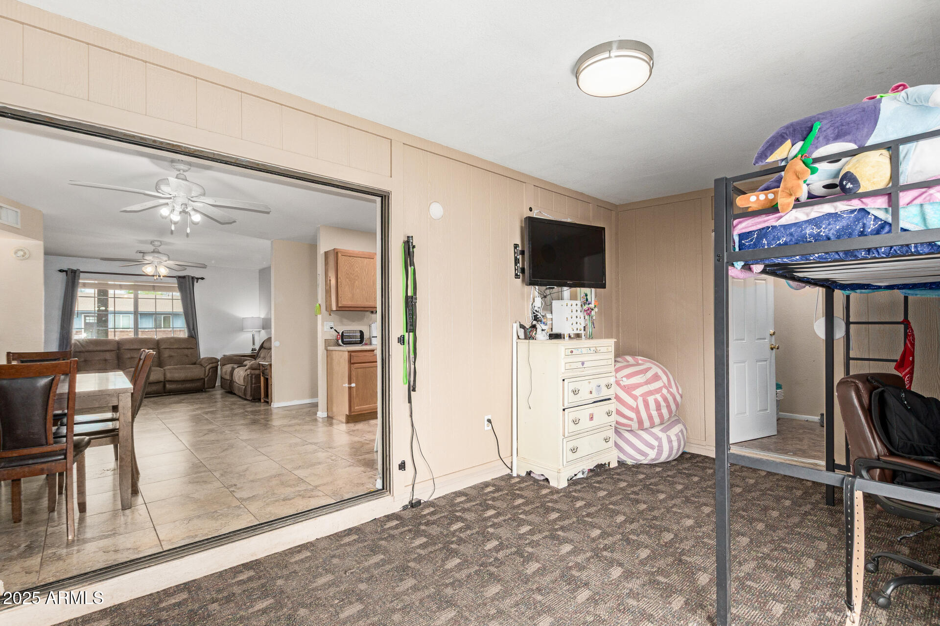 1980 South Apache Drive Apache Junction, AZ 85120 - Photo 14 of 19 a view of a livingroom with furniture and a flat screen tv