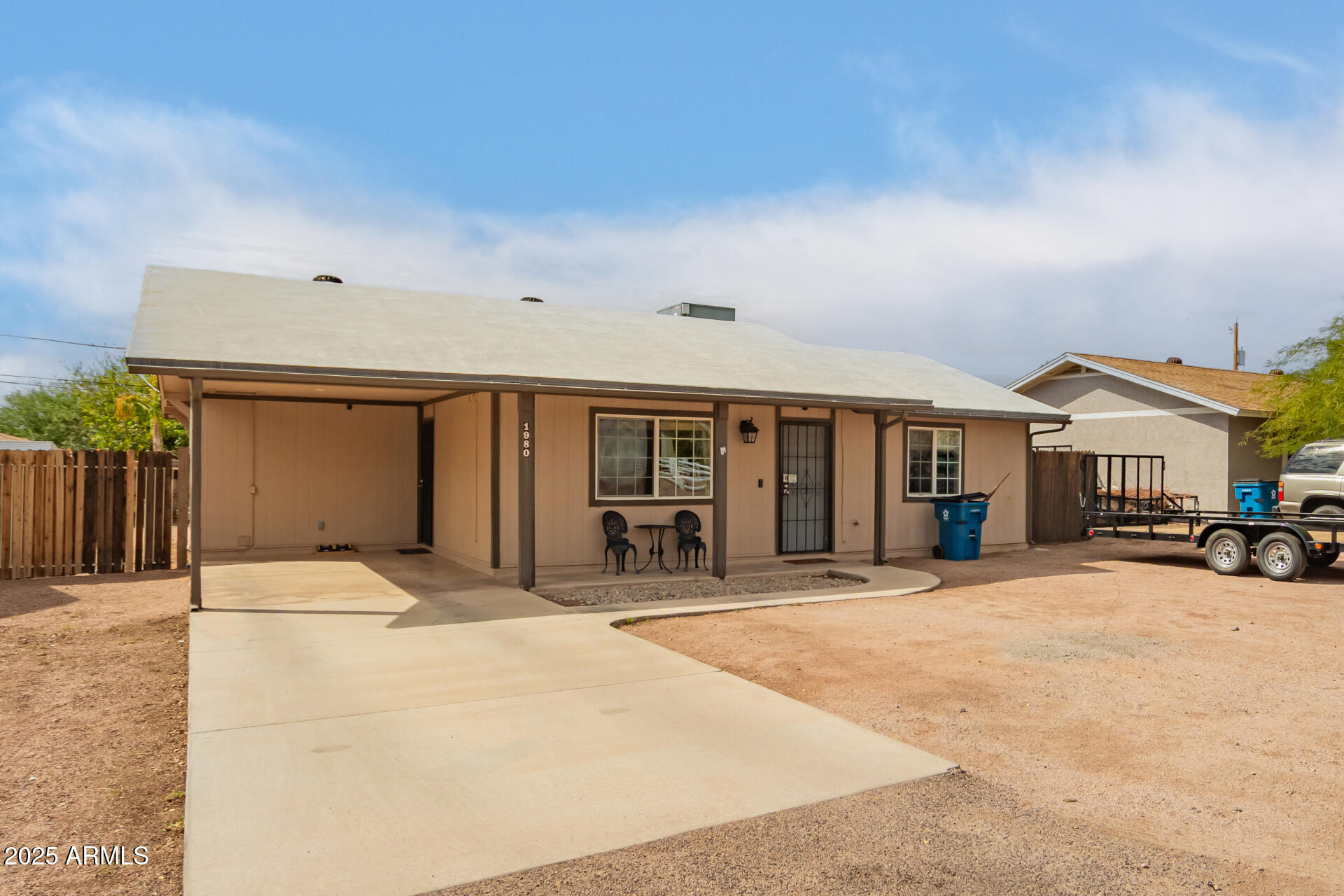 1980 South Apache Drive Apache Junction, AZ 85120 - Photo 3 of 19 a front view of a building with a outdoor space