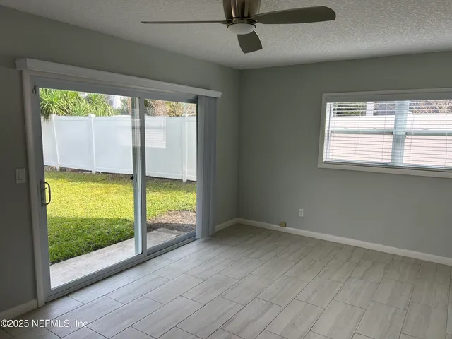 a view of storage and utility room with racks on the wall