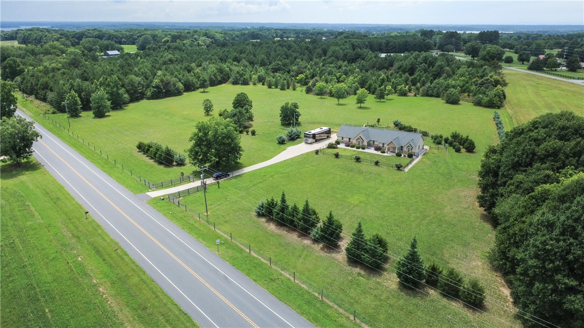 2900 Highway 187 Anderson, SC 29626 - Photo 34 of 41 Sprawling grounds embrace a graceful residence, offering a serene rural escape.