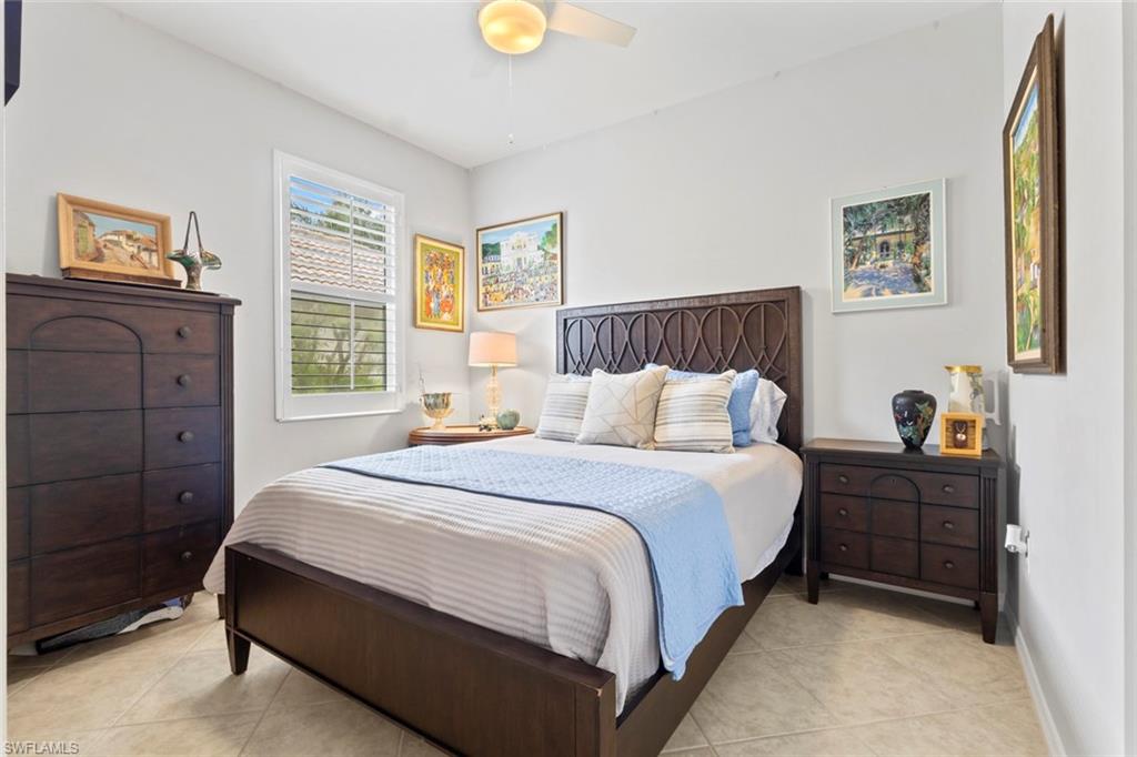 5719 Declaration Court Ave Maria, FL 34142 - Photo 19 of 48 a bed room with a bed and a window