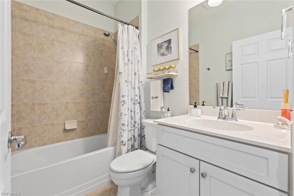 5719 Declaration Court Ave Maria, FL 34142 - Photo 20 of 48 a bathroom with a sink toilet and shower