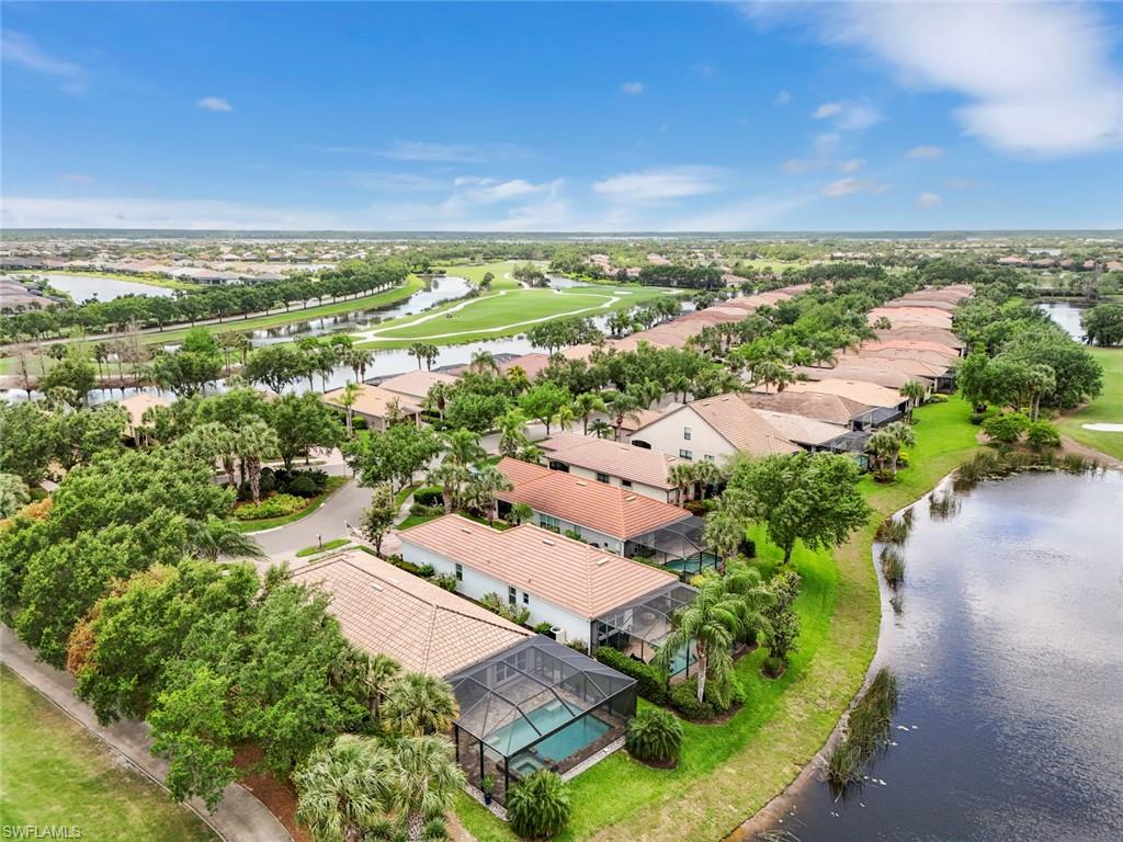5719 Declaration Court Ave Maria, FL 34142 - Photo 35 of 48 an aerial view of residential houses with outdoor space