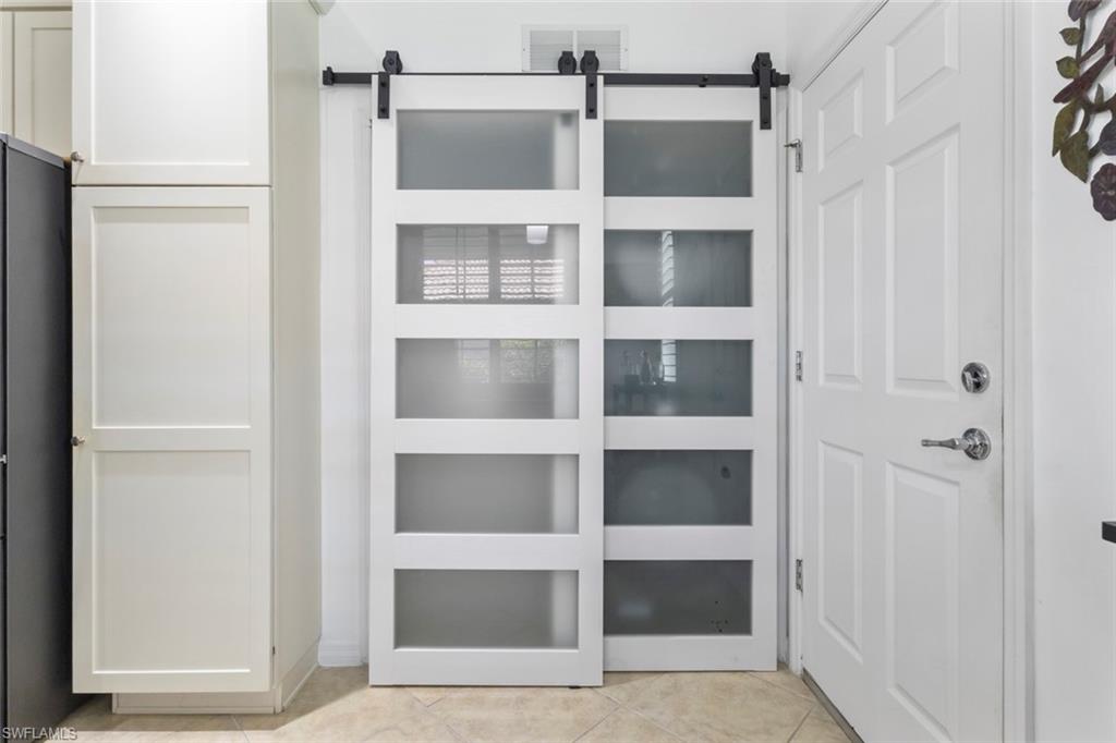 5719 Declaration Court Ave Maria, FL 34142 - Photo 9 of 48 a view of an empty room with empty closet