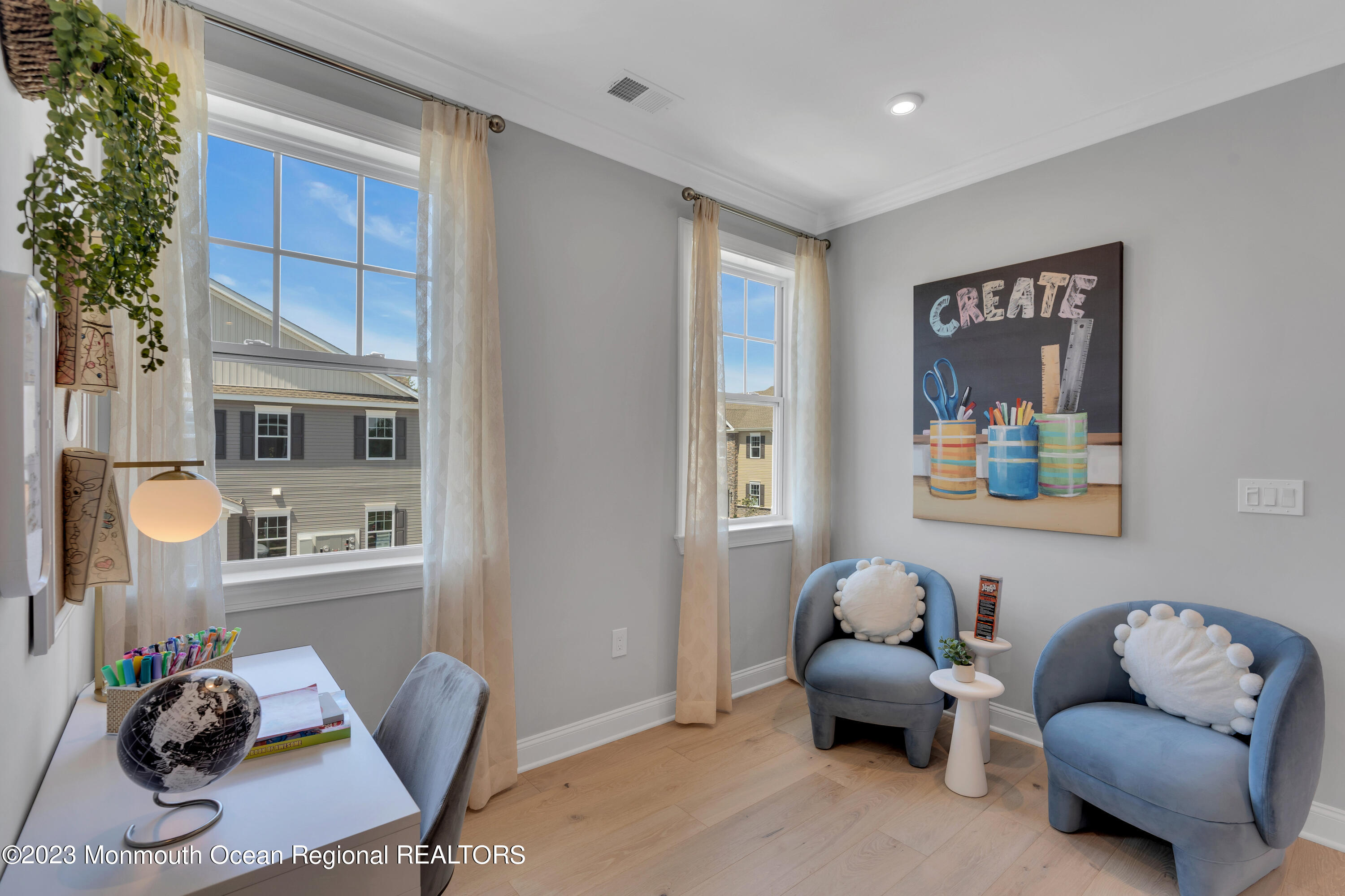 22 Chapel Lane Neptune, NJ 07753 - Photo 11 of 30 a living room with furniture and a window