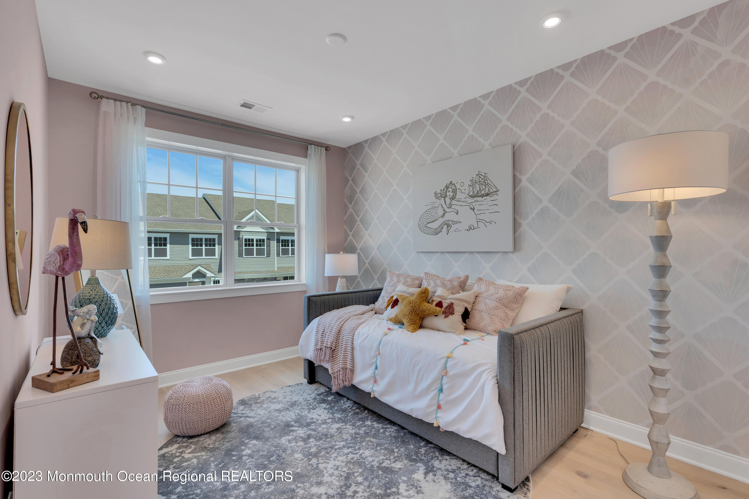 22 Chapel Lane Neptune, NJ 07753 - Photo 15 of 30 a bed room with a bed and a window