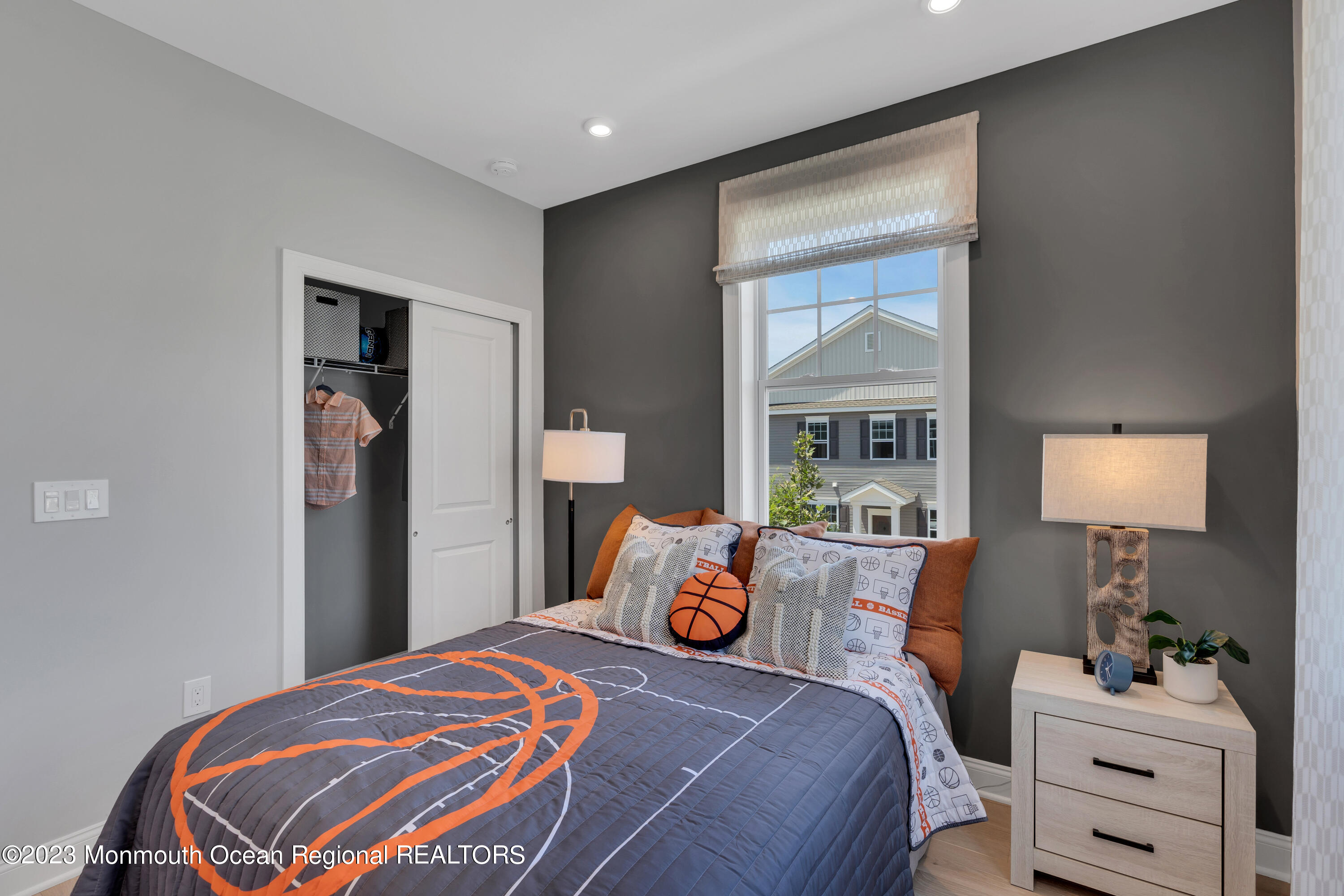 22 Chapel Lane Neptune, NJ 07753 - Photo 18 of 30 a bedroom with a bed and a large window