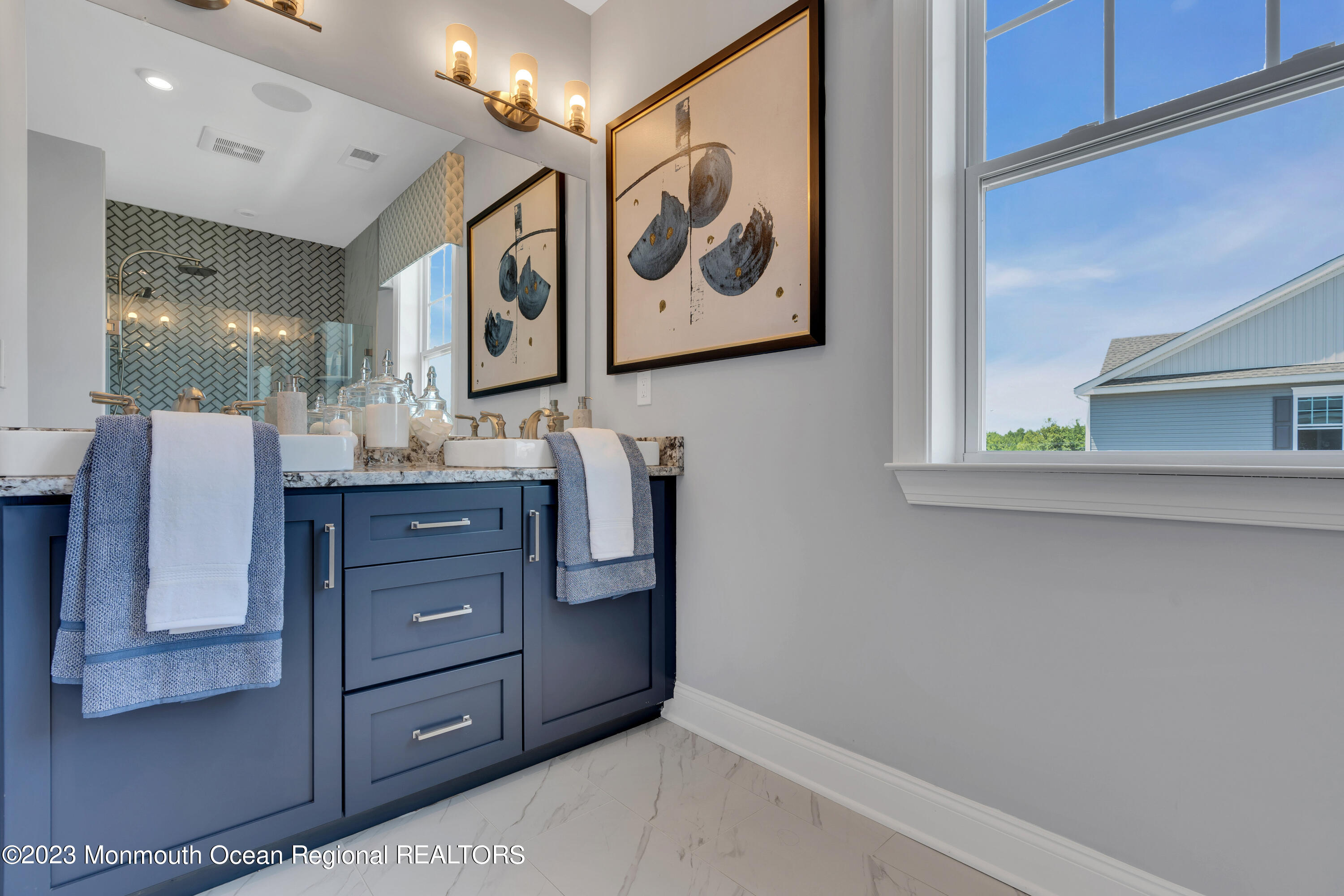22 Chapel Lane Neptune, NJ 07753 - Photo 24 of 30 a bathroom with a a sink and a mirror