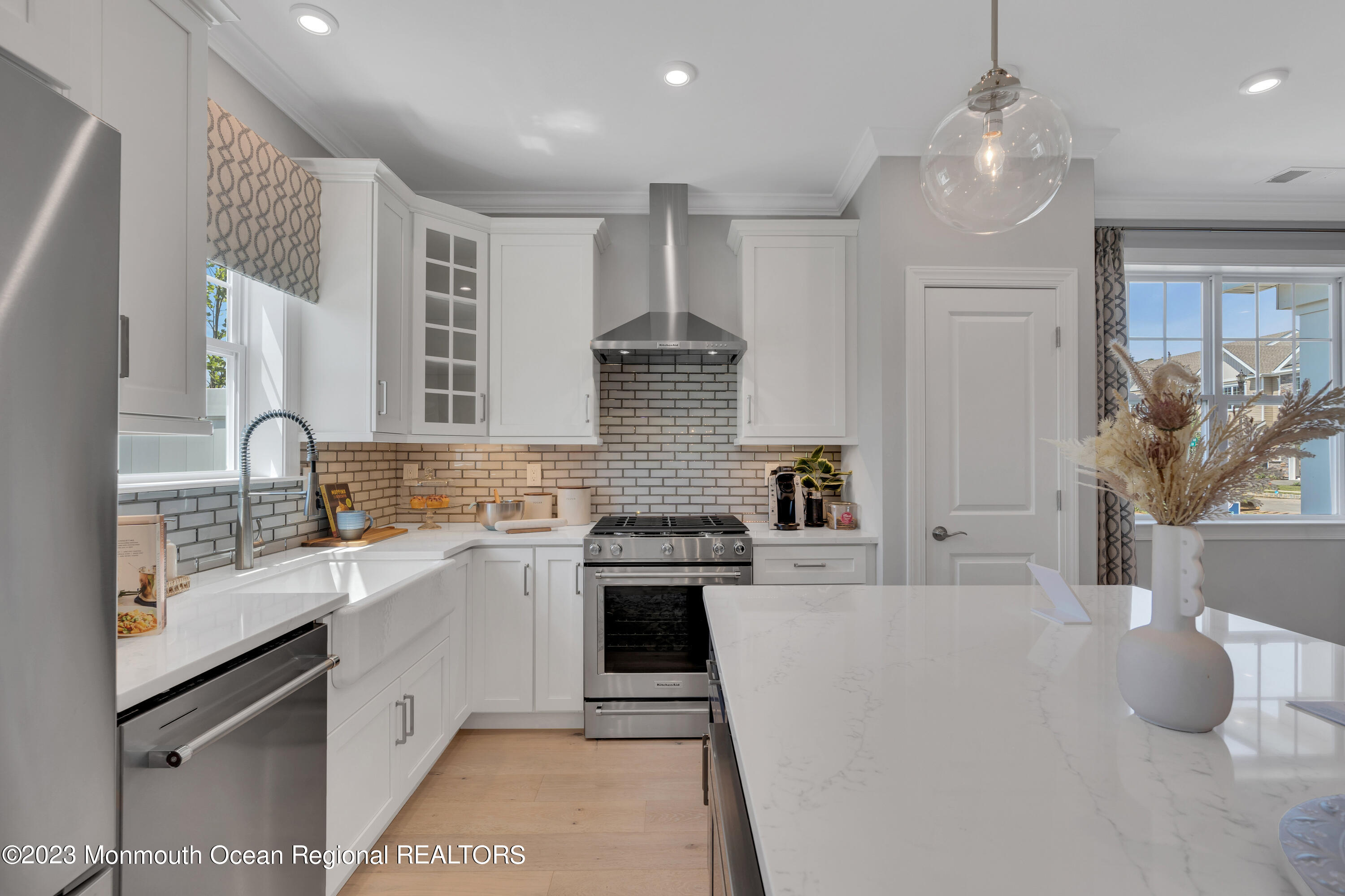 22 Chapel Lane Neptune, NJ 07753 - Photo 7 of 30 a kitchen with cabinets and window