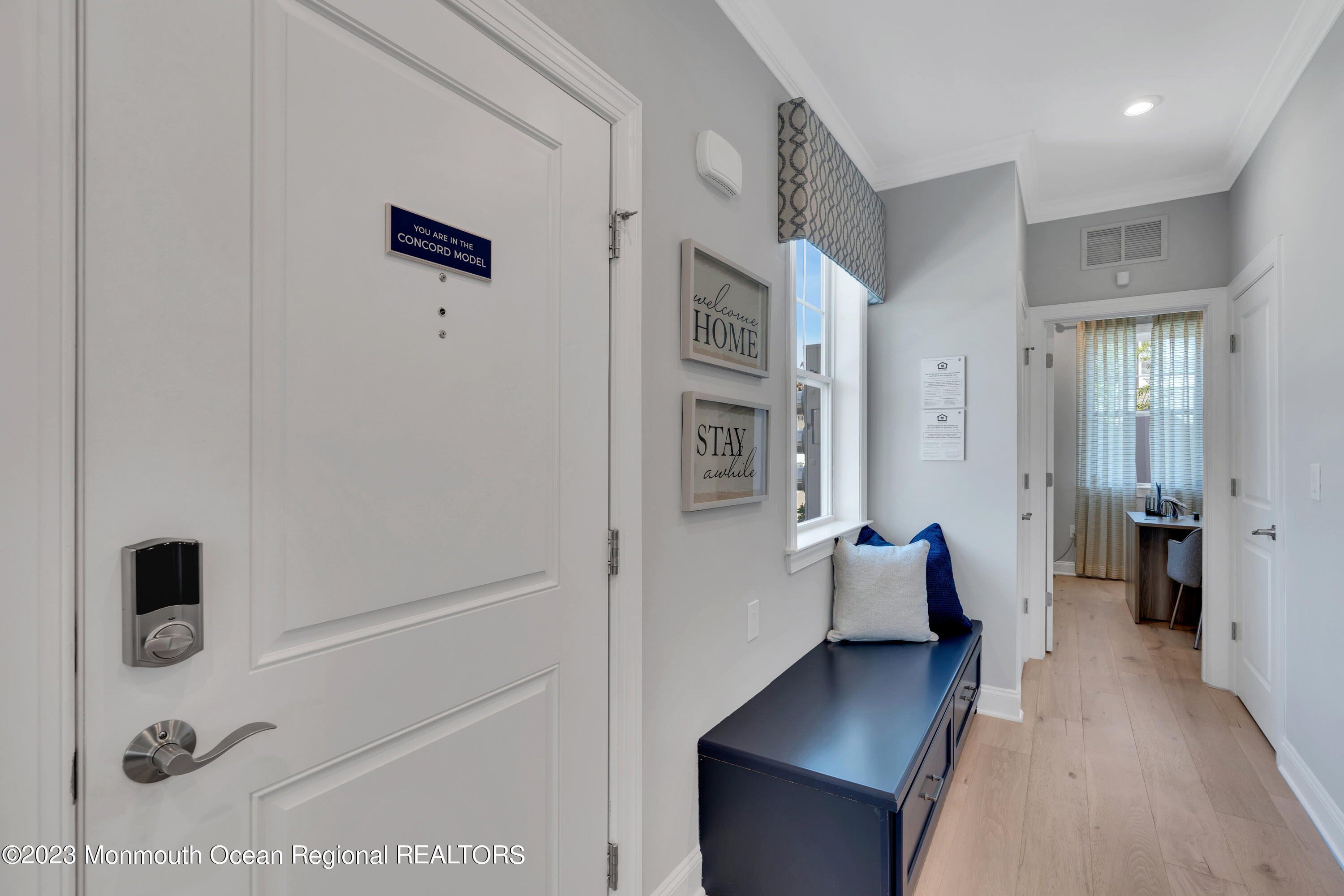 22 Chapel Lane Neptune, NJ 07753 - Photo 8 of 30 a hallway with furniture and wooden floor