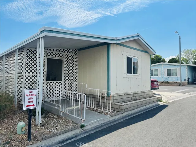 a front view of a house with garage