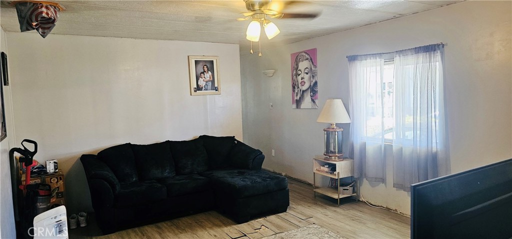 20683 Waalew Road, Unit B145 Apple Valley, CA 92307 - Photo 12 of 32 a living room with furniture and a window