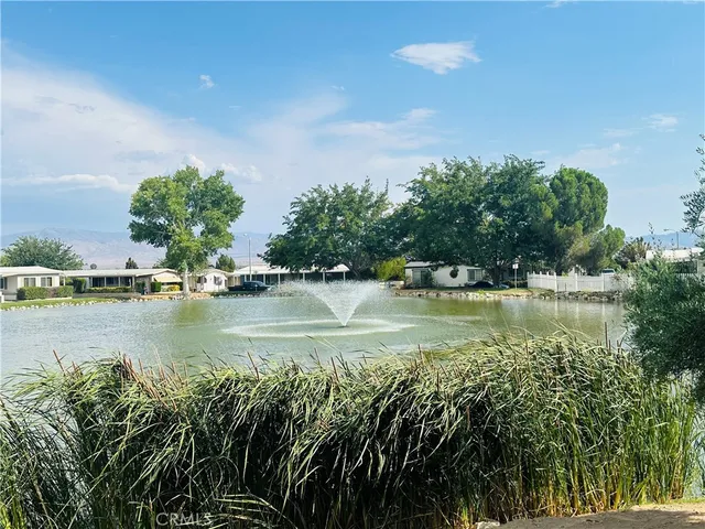 a view of lake view with houses in back