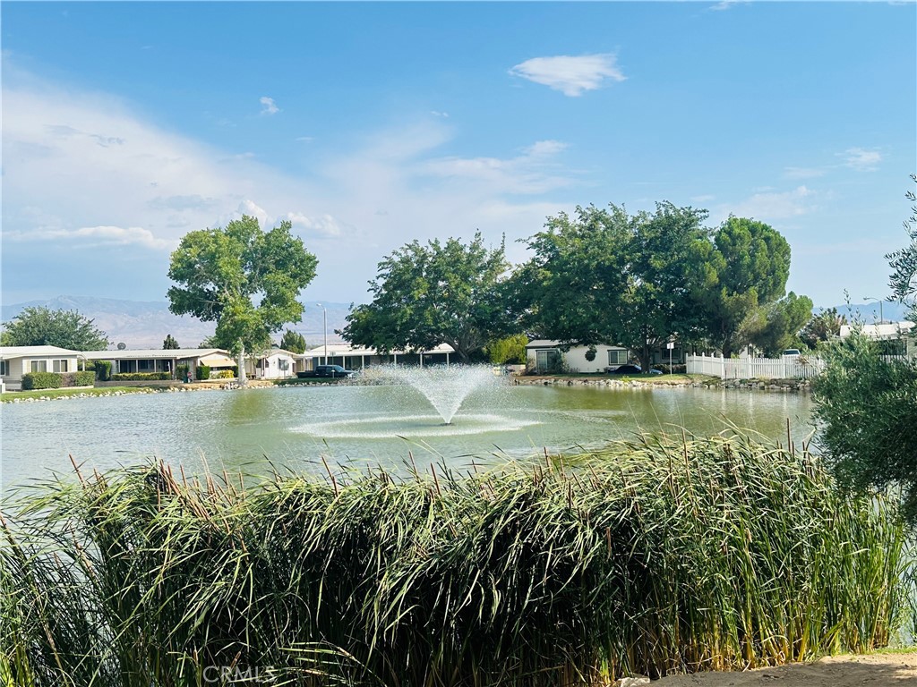 20683 Waalew Road, Unit B145 Apple Valley, CA 92307 - Photo 24 of 32 a view of lake view with houses in back