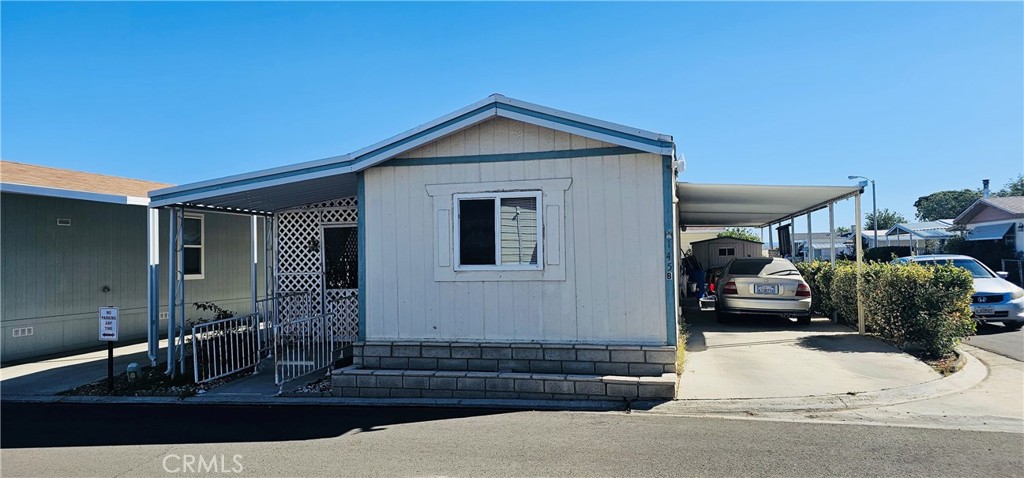 20683 Waalew Road, Unit B145 Apple Valley, CA 92307 - Photo 32 of 32 a house view with a outdoor space
