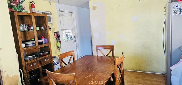 a room with furniture and a book shelf