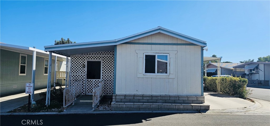 20683 Waalew Road, Unit B145 Apple Valley, CA 92307 - Photo 7 of 32 a view of a house with wooden fence