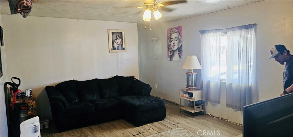 20683 Waalew Road, Unit B145 Apple Valley, CA 92307 - Photo 10 of 32 a living room with furniture