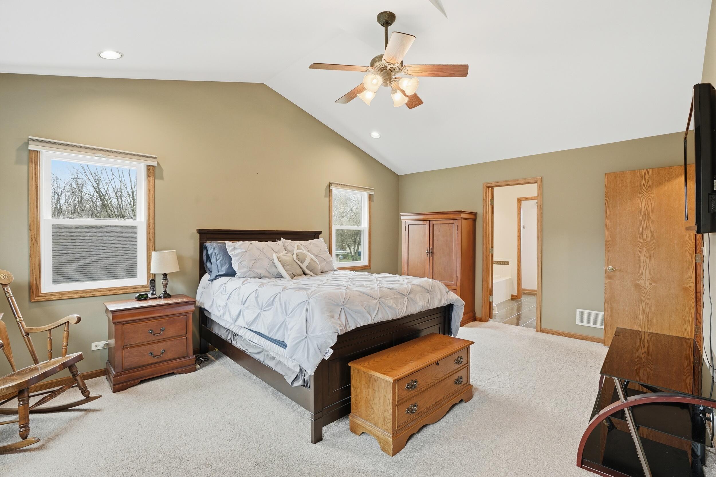 1122 Douglas Lane Crete, IL 60417 - Photo 14 of 28 a spacious bedroom with a bed and window