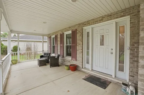 an aerial view of a house with outdoor space