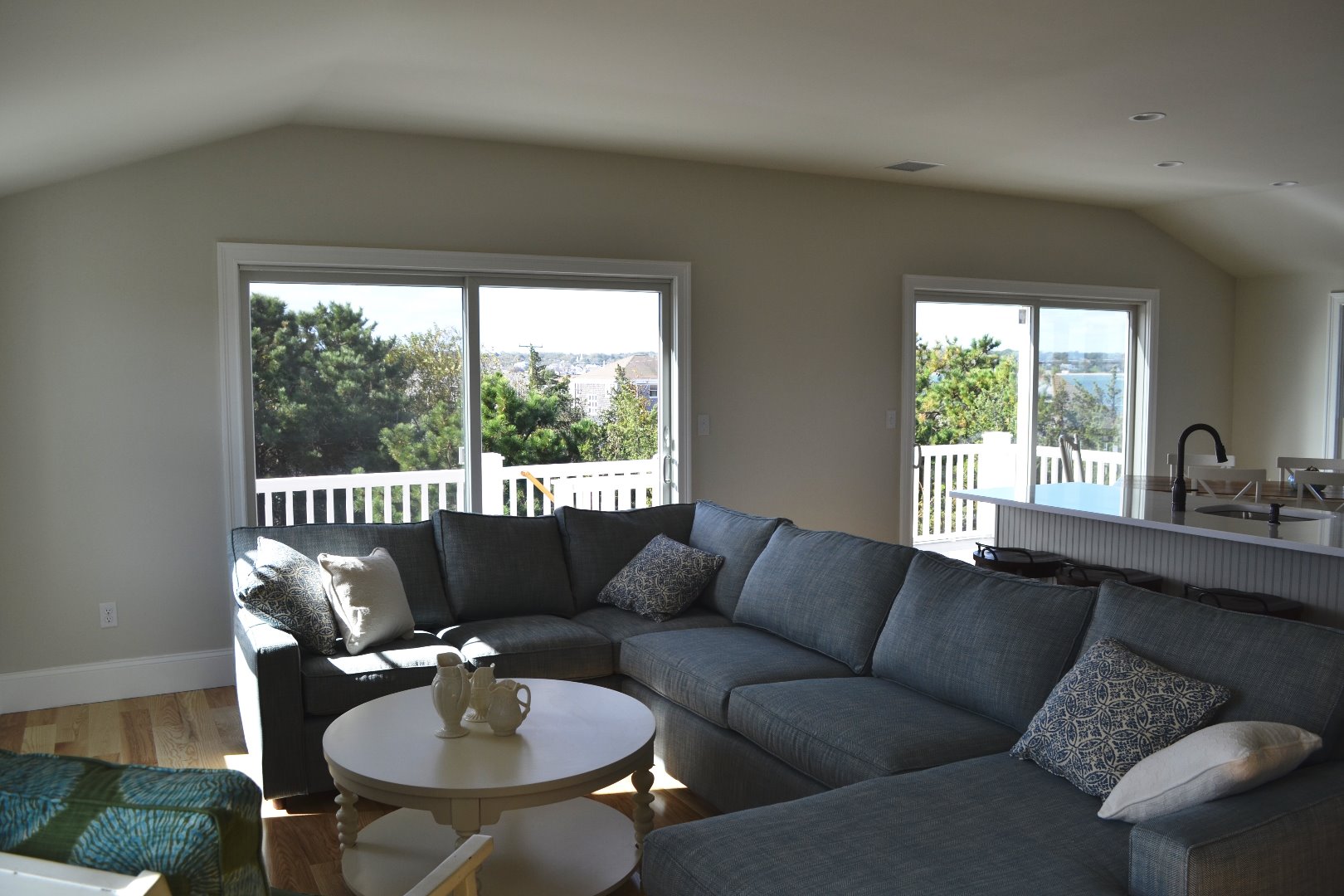 28 Beach Road Oak Bluffs, MA 02557 - Photo 16 of 32 a living room with furniture and a large window