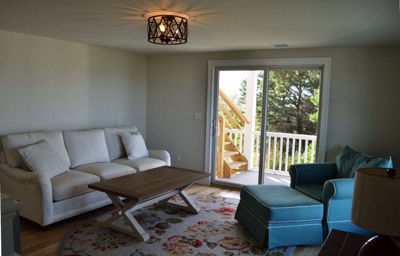 28 Beach Road Oak Bluffs, MA 02557 - Photo 17 of 32 a living room with furniture and a large window