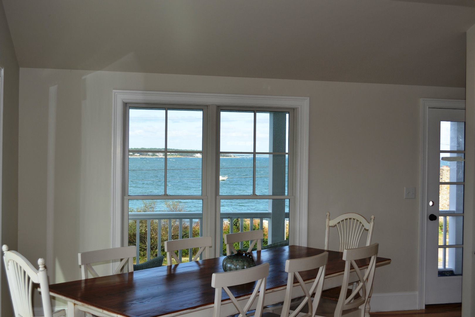 28 Beach Road Oak Bluffs, MA 02557 - Photo 2 of 32 a living room with furniture and a window