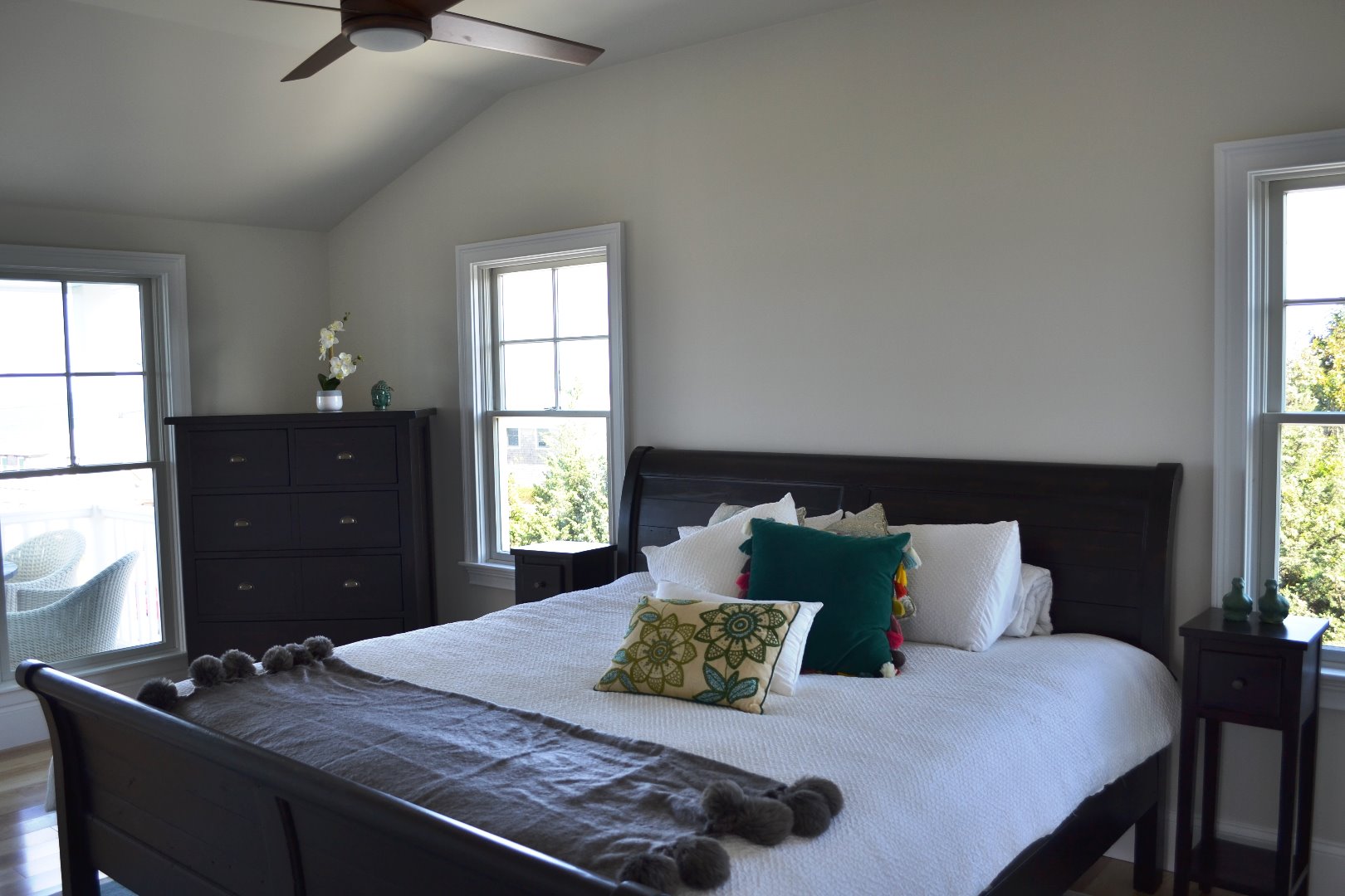 28 Beach Road Oak Bluffs, MA 02557 - Photo 21 of 32 a bedroom with a bed and window