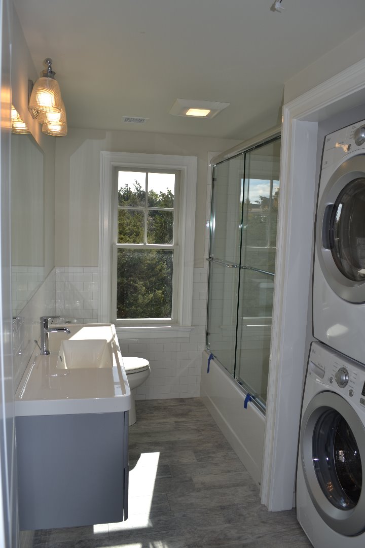 28 Beach Road Oak Bluffs, MA 02557 - Photo 28 of 32 a bathroom with a sink a toilet and shower
