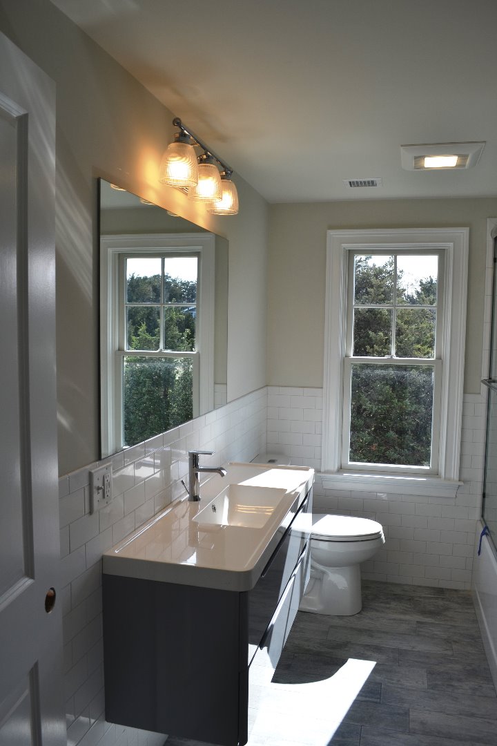 28 Beach Road Oak Bluffs, MA 02557 - Photo 29 of 32 a bathroom with a sink and a bathtub